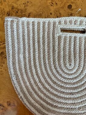 Neutral Cream and Tan Braided Half-Round Clutch with Handled Cutout